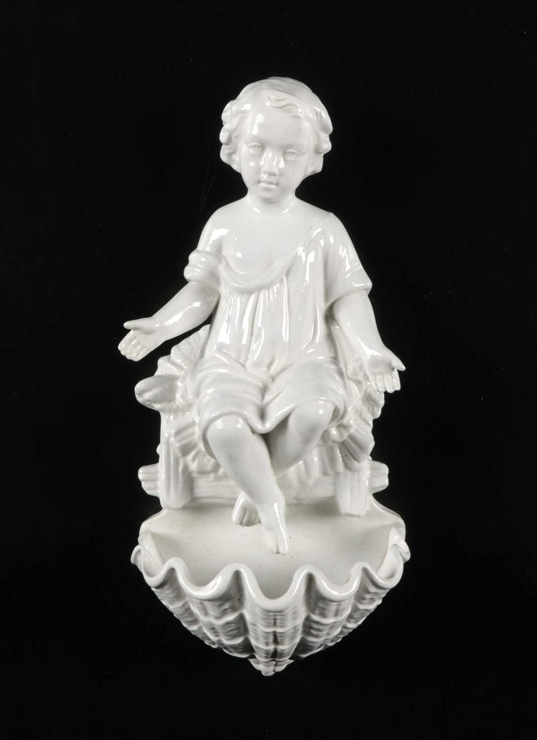 Lot 92 - Porcelain Holy Water Font Depicting the Infant Christ, by Petrus Regout
