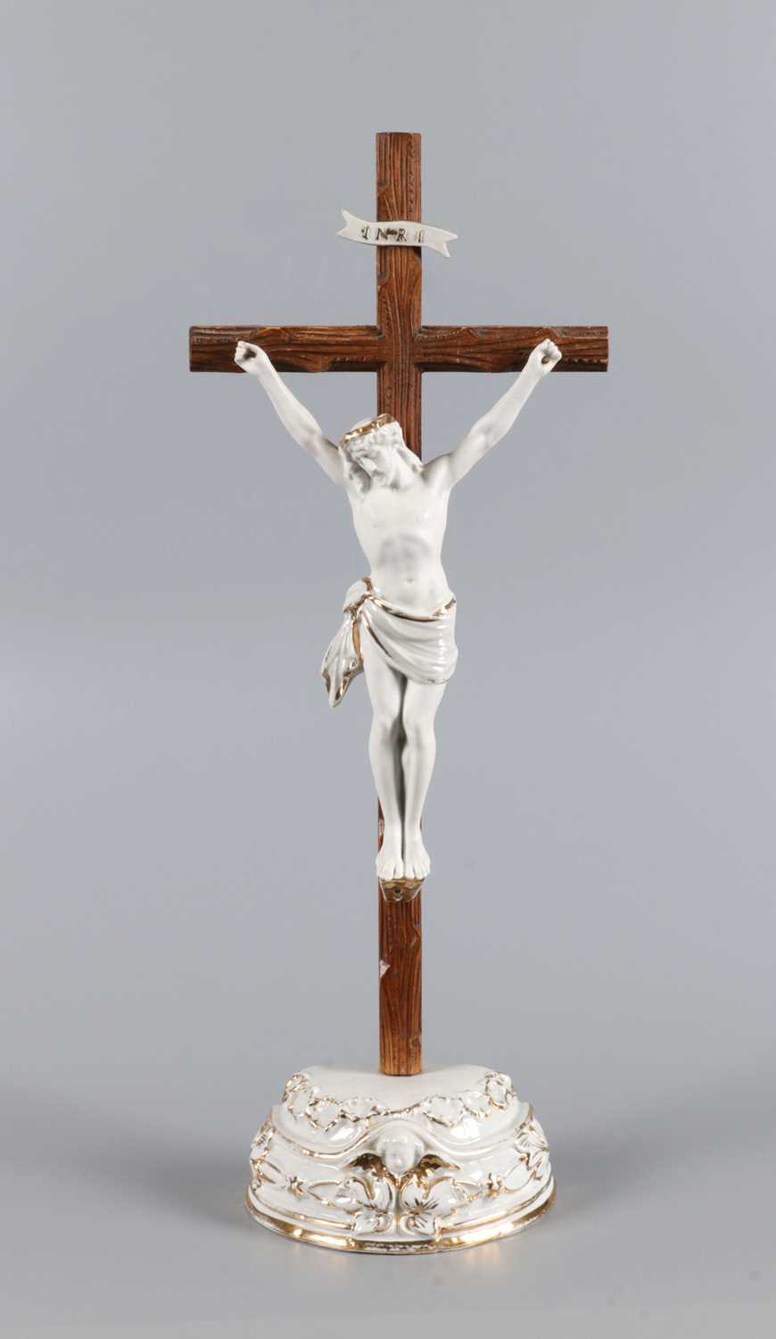 Lot 100 - Porcelain Crucifix with Gilt Rococo Base and Wooden Cross