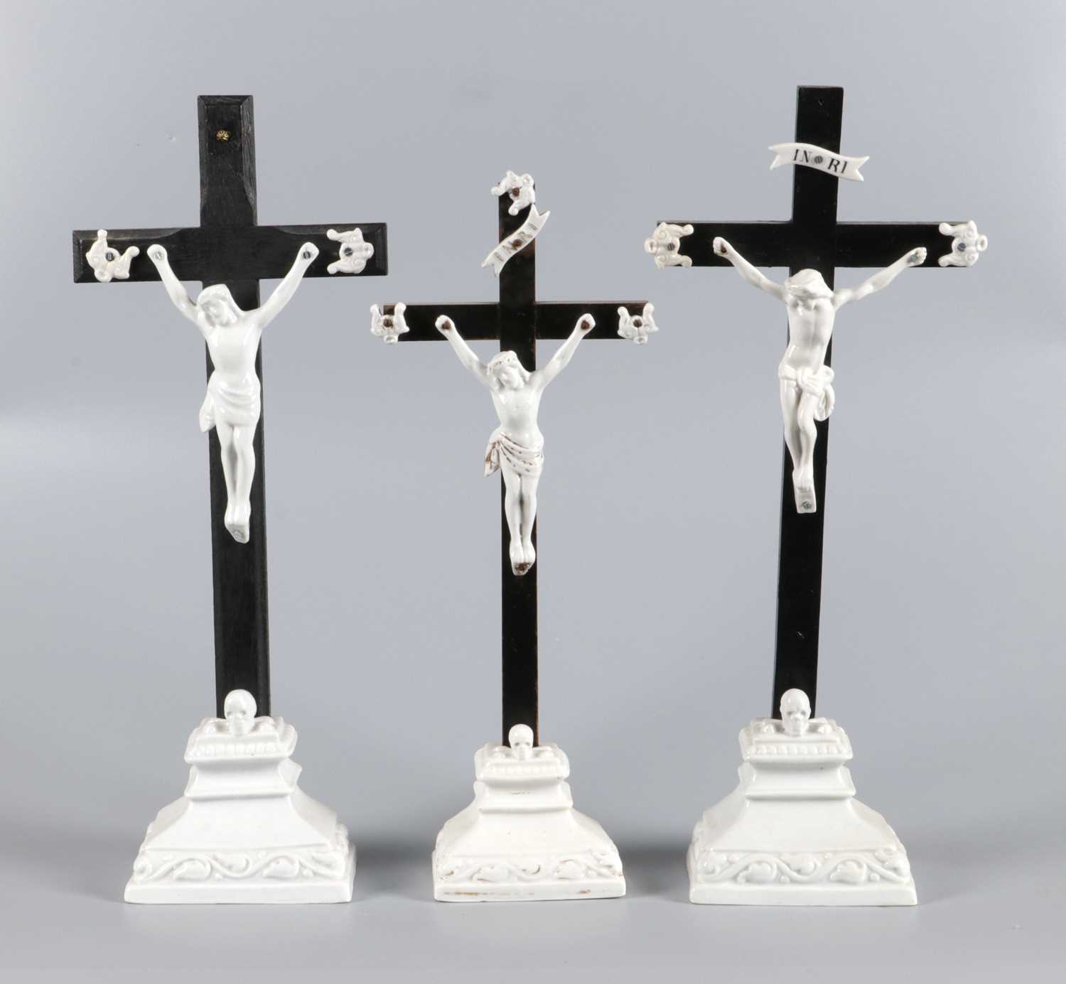 Lot 107 - Three Porcelain Corpus Figures on Wooden Crosses, Vieux Paris.