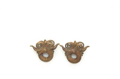 Lot 3159 - Indonesië, twee bronzen oorsieraden