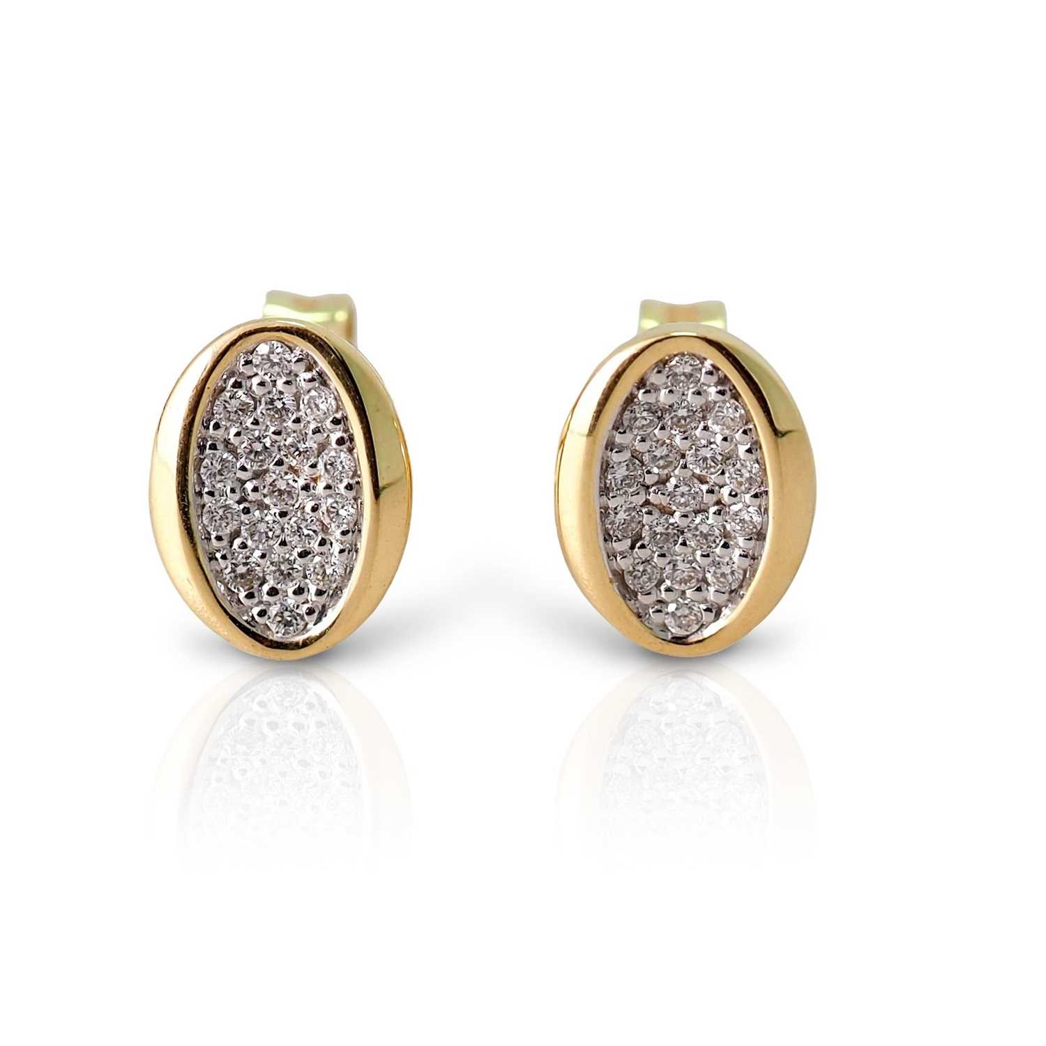 Lot 531 - Pair of 14K Gold Ear Studs with Diamonds