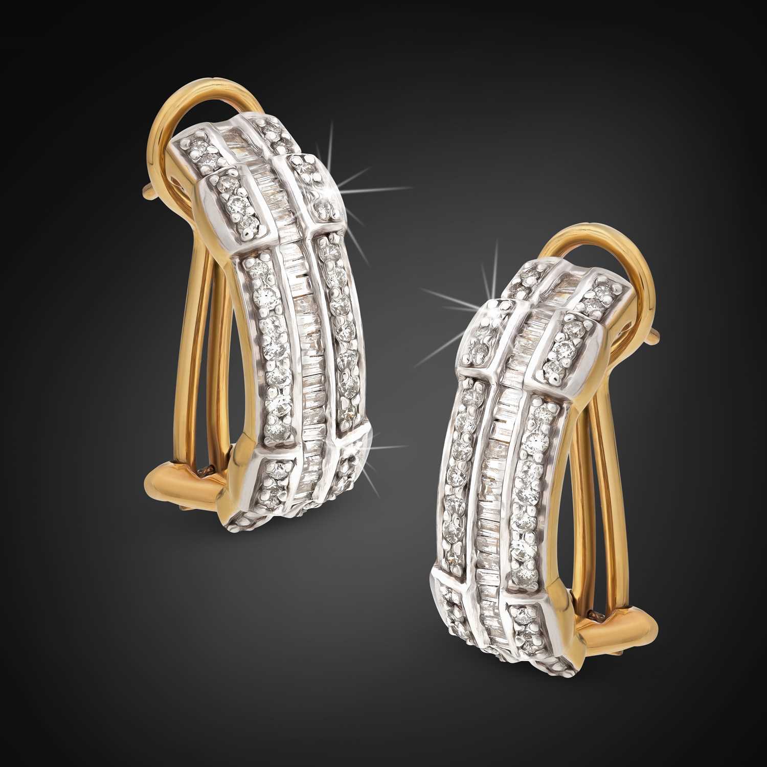 Lot 33 - Pair of Gold Ear Clips set with Diamonds