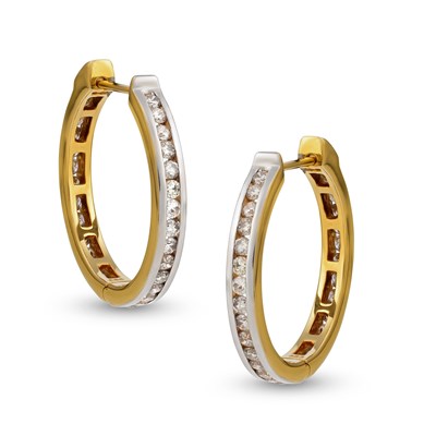 Lot 548 - 14K Pair of Gold Diamond Eternity Earrings