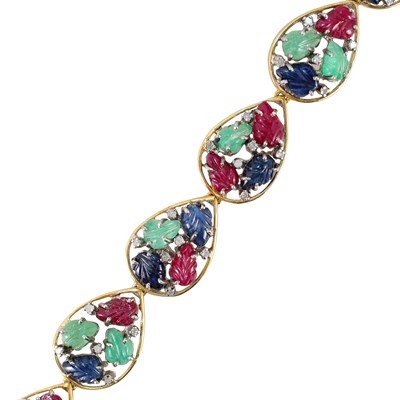 Lot 551 - An Emerald, Ruby, Sapphire, and Diamond "Tutti Frutti" Bracelet