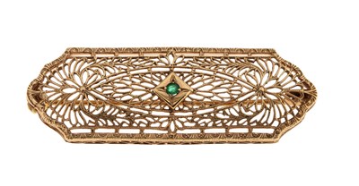Lot 14 - 14K Gold Brooch set with Emerald Solitaire