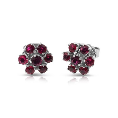 Lot 568 - Pair of 14K White Gold Ruby Ear Studs