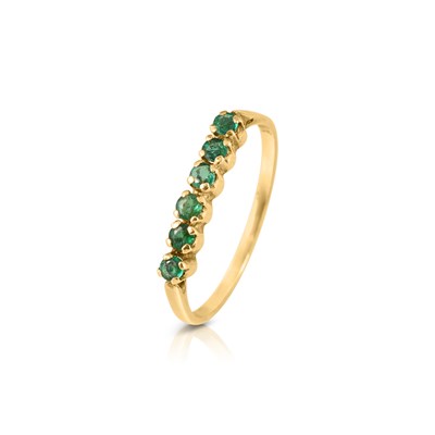 Lot 409 - Gold Eternity Ring set with Emerald