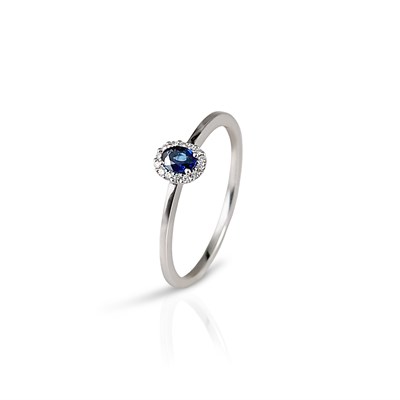 Lot 432 - White Gold Ring with Diamonds and Sapphire Solitaire