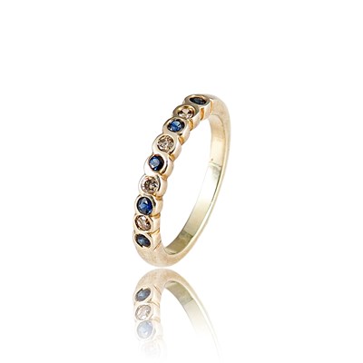 Lot 451 - Gold Eternity Ring set with Diamonds and Sapphire