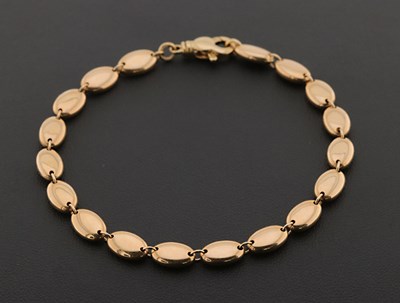 Lot 70 - 14K Gold Bracelet With Oval-Shaped Ornaments