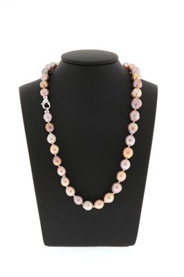 Lot 771 - Salmon Coloured Baroque Pearl Necklace with Silver Lock