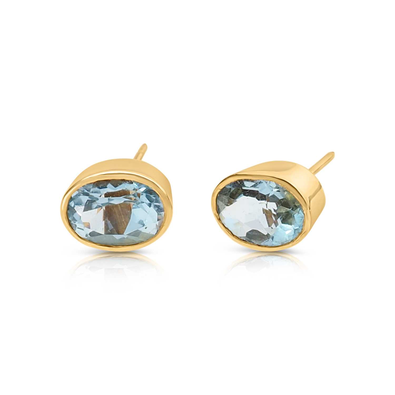 Lot 513 - Pair of 14K Gold and Aquamarine Ear Studs
