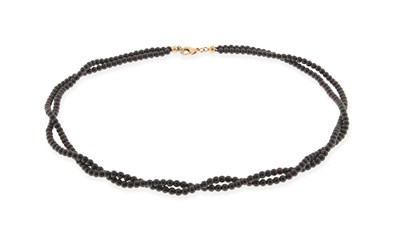 Lot 856 - 2-Strand Black Onyx Necklace with Gold Lock
