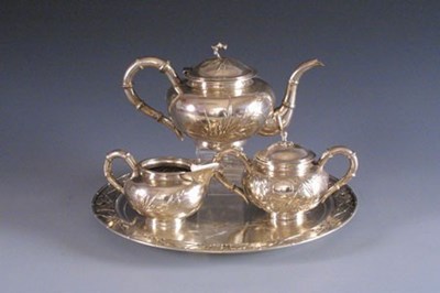 Lot 1614 - Zilveren theeservies op blad.