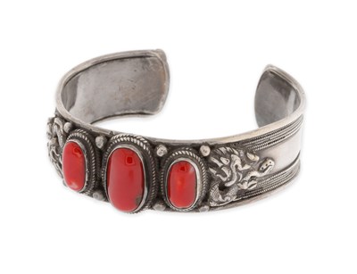 Lot 201 - Tibetan Sterling Silver and Red Coral Dragon Bracelet