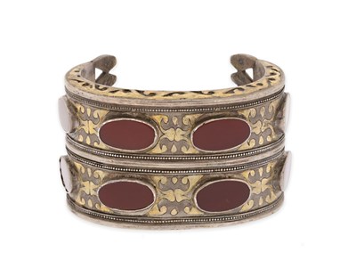 Lot 217 - A Fire-Gilded Silver and Carnelian ‘Bilezik’ Cuff Bracelet.