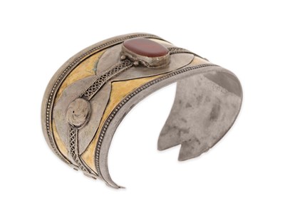Lot 150 - A Fire-Gilded Silver and Carnelian ‘Bilezik’ Cuff Bracelet