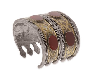 Lot 219 - A Fire-Gilded Silver and Carnelian ‘Bilezik’ Cuff Bracelet