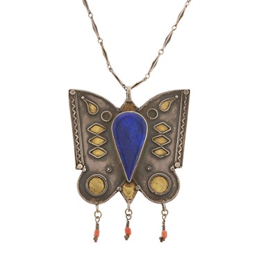 Lot 161 - A Turkmen Fire-Gilded Silver Butterfly Pendant