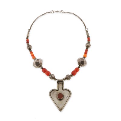 Lot 140 - A Turkmen Silver and Carnelian Beads Necklace