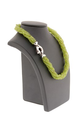 Lot 580 - 4-Strand Peridot Necklace with Silver Lock