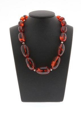 Lot 604 - Large Amber Necklace with Silver Lock