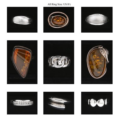 Lot 216 - Nine Silver Rings, some set with Amber