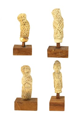 Lot 114 - Four Ivory and Bone Kris/Keris Handles.