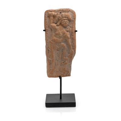 Lot 29 - A Terracotta Plaque Depicting a Shaman with Monkey