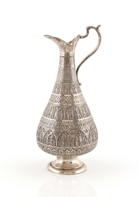 Lot 104 - A Persian Repoussé Silver Jug