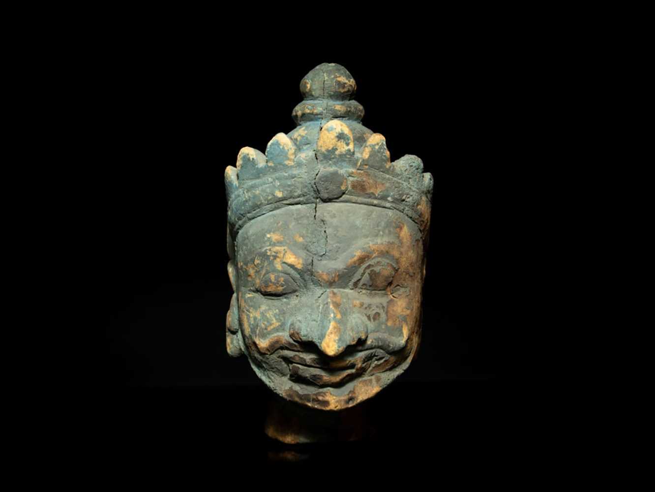 Lot 40 - A Large Carved and Painted Head of Garuda