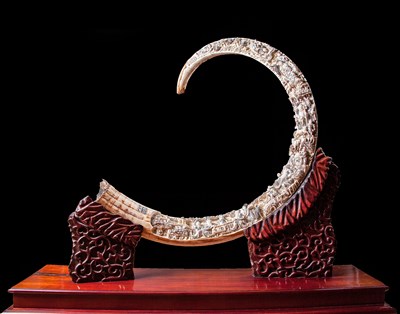 Lot 32 - Impressive Carved Fossil Woolly Mammoth Tusk on Custom Stand