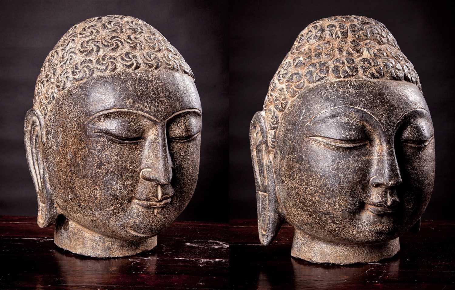 Lot 31 - Two Chinese Carved Dark Gray Stone Heads of Buddha