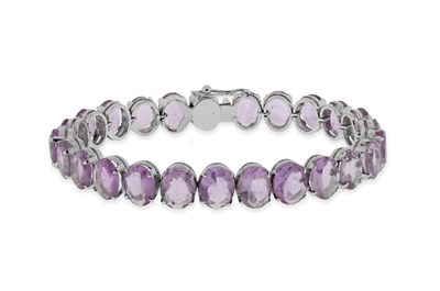 Lot 534 - Amethyst and Silver Bracelet.