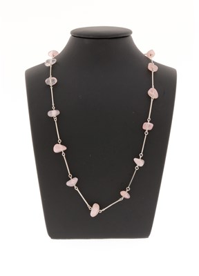 Lot 551 - A Pink Quartz and Silver Necklace