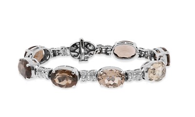 Lot 562 - A Smoky Topaz Bracelet