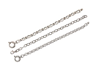 Lot 586 - Three Sterling Silver Chain-link Bracelets