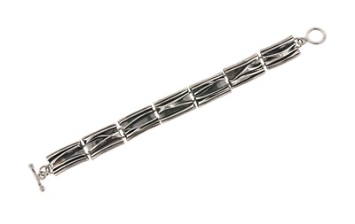 Lot 585 - A Sterling Silver Design Bracelet