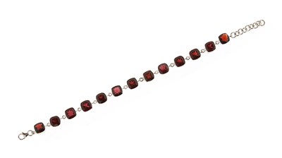 Lot 626 - Sterling Silver Bracelet with Facet Cut Garnets