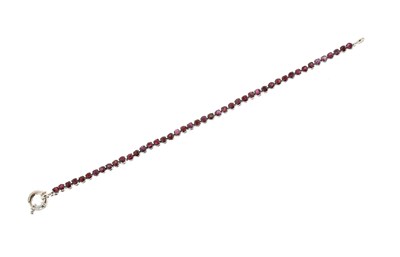 Lot 612 - A Ruby and Sterling Silver Bracelet