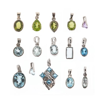 Lot 639 - 15 Sterling Silver Pendants set with Topaz and Peridot