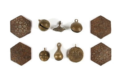 Lot 131 - A Group of Indian Molds, Bells, and Pendants