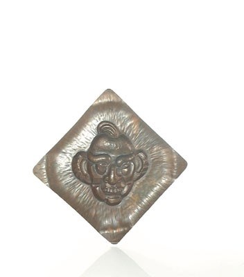 Lot 7369 - Gedreven koperen schotel van clown