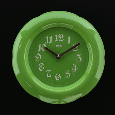 Lot 864 - A Mauthe Electric Ceramic Wall Clock