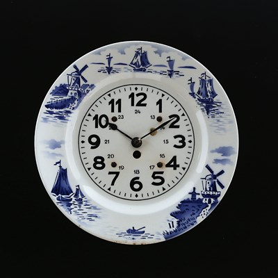 Lot 874 - A Blue Delft Ceramic Wall Clock