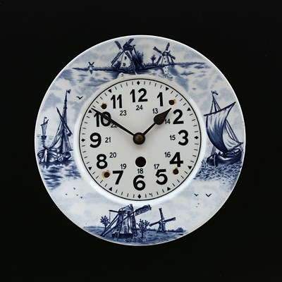 Lot 876 - A Blue Delft Ceramic Wall Clock