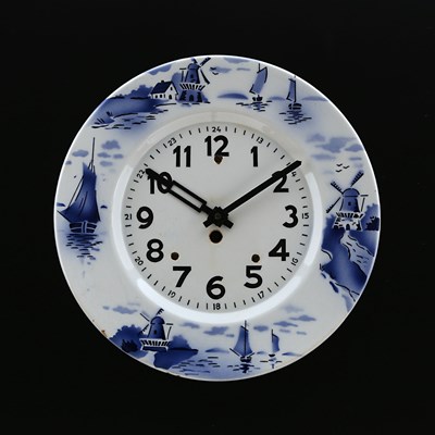 Lot 880 - A Blue Delft Ceramic Wall Clock