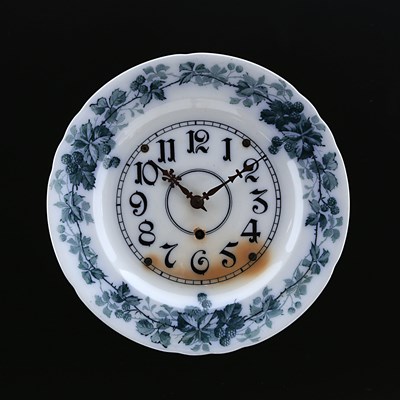 Lot 883 - A Ceramic Wall Clock