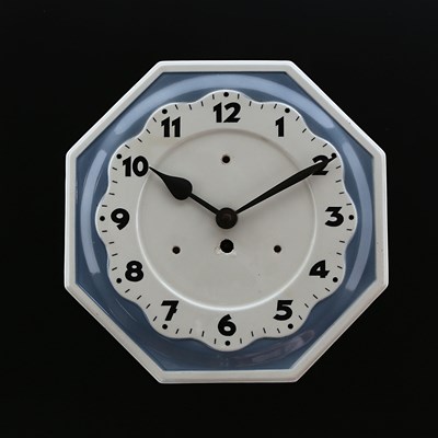 Lot 890 - An Enamel Wall Clock