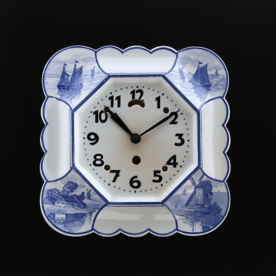 Lot 897 - A Blue Delft Ceramic Wall Clock